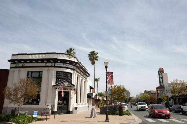 Brentwood, California, USA - April 17, 2023: Afternoon traffic passes through the historic urban core of the Contra Costa County city.