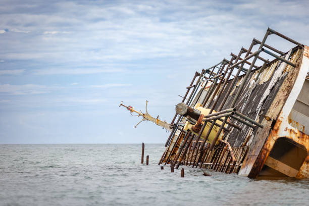 Shipwreck on middle of Sulu sea with cloud sky background.Palawan Island - Philippines.
