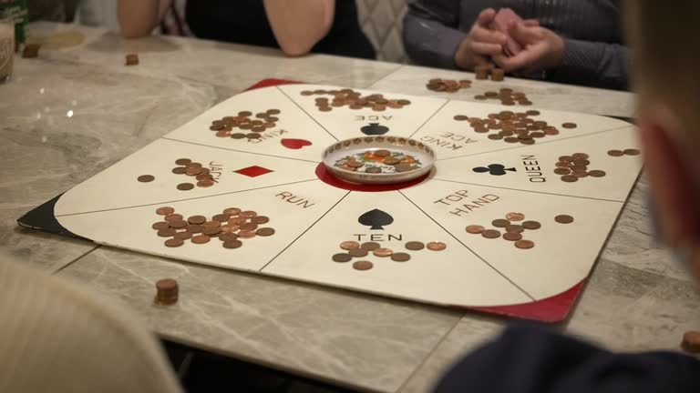 Dirty frame of card game, a man shuffles a pack of cards in slow motion