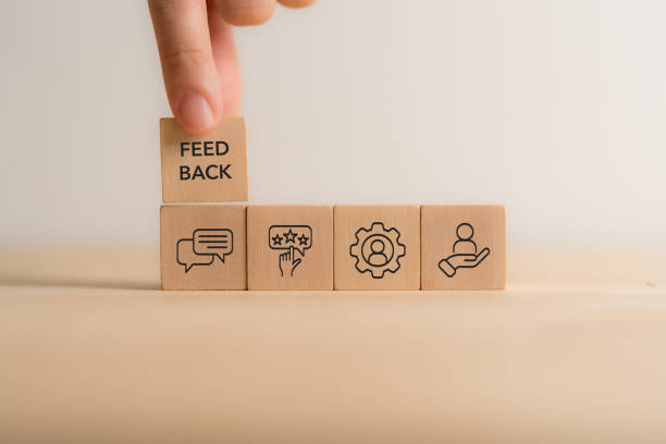 istock Get feedback for improvement. Listen to team and customer feedback to improve work efficiency. Team communication skill, engagement, idea sharing, open mind, customer feedback and consulting. 2203539844