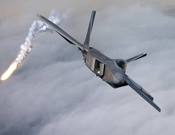 istock Close view of a a F-22 Raptor  deploying flares 2203542820