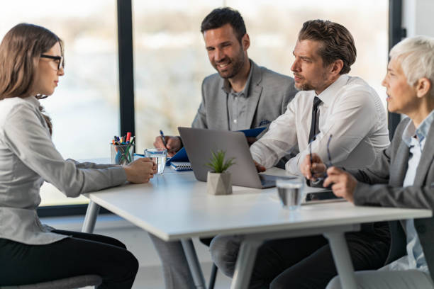 istock Human resource team talking to a candidate on a job interview. 2203549822