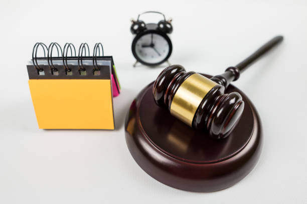 istock judge gavel with alarm clock on white 2203551541