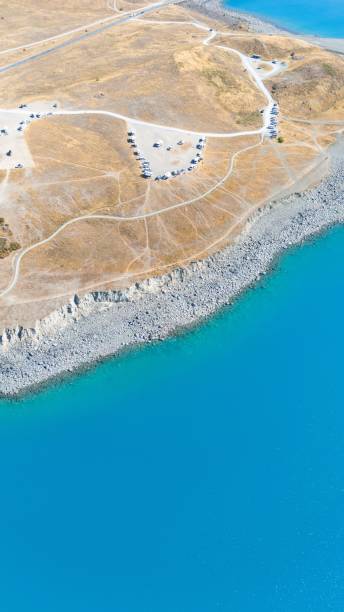 istock Aerial view of coastline with turquoise waters. 2203551974