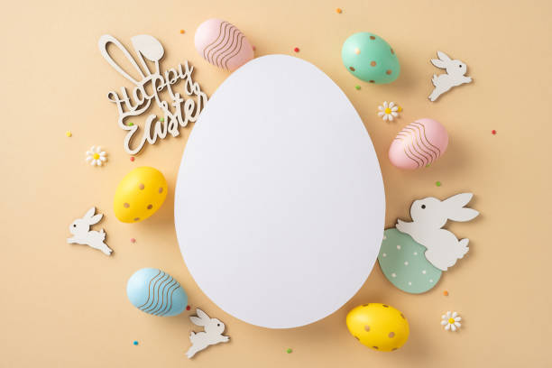 istock Easter-themed arrangement featuring pastel eggs, bunny decorations, and a blank central egg shape 2203556805
