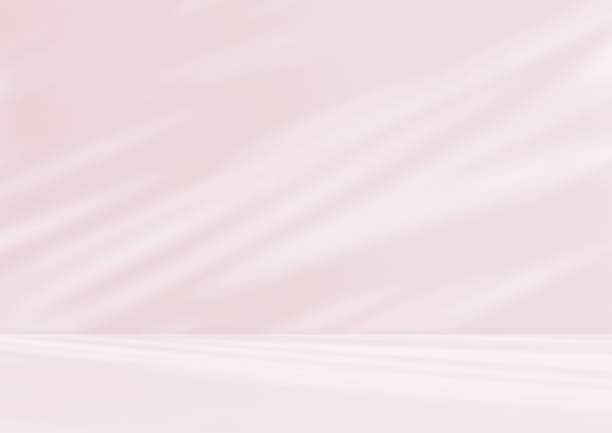 istock Empty pink colour room studio with sunlight effect shadow on the floor and wall for product presentation. 2203557183