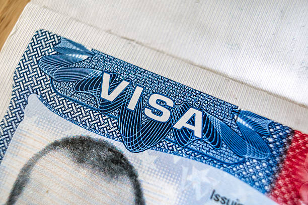 istock Visa USA in Foreign Passport for Tourism 2203557568