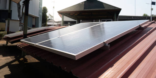 istock Solar energy systems. Solar panels installed on a rooftop in sunlight. 2203559142