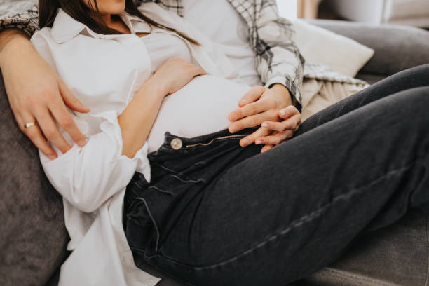 istock Happy future parents bonding at home 2203561988