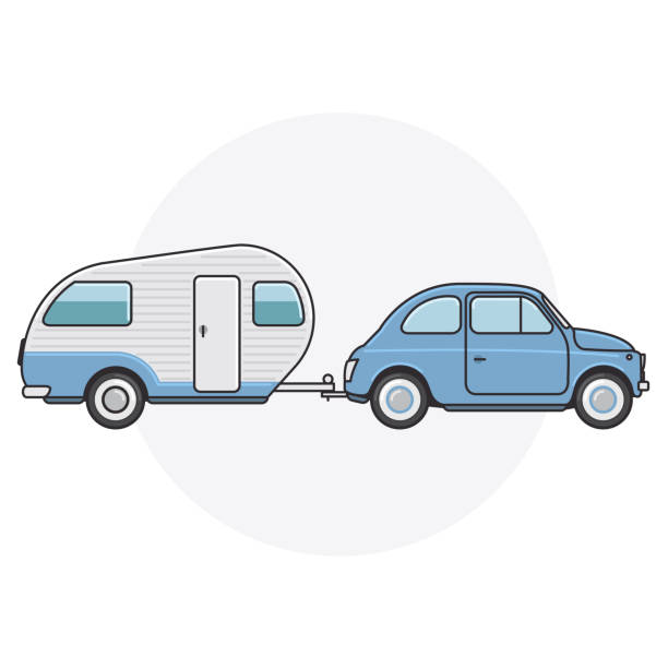 istock Retro car with camper trailer - travel on vintage automobile 2203563354