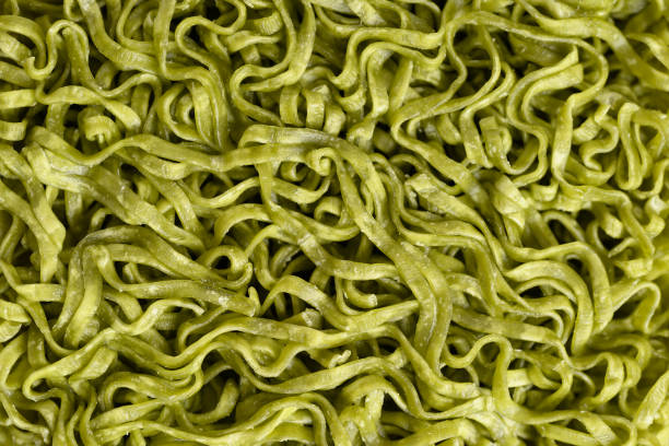 istock Instant green noodles texture, Food background 2203563975