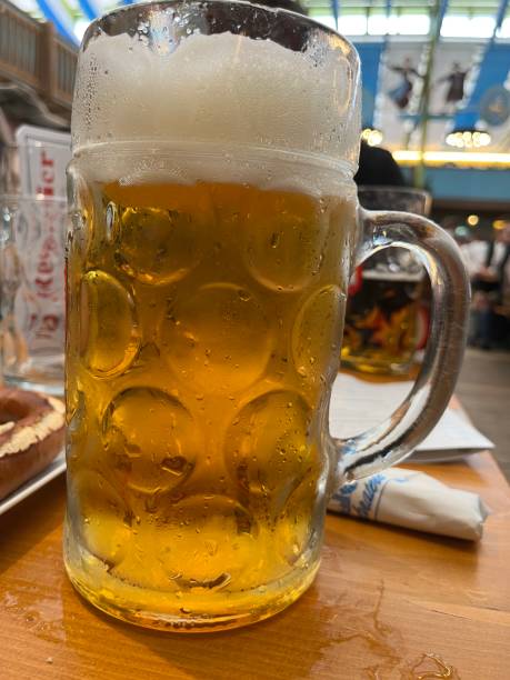 istock October fest glass mug filled with beer 2203565213
