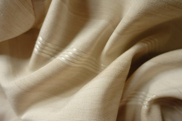 istock light beige striped cotton and polyester fabric in soft folds 2203566024