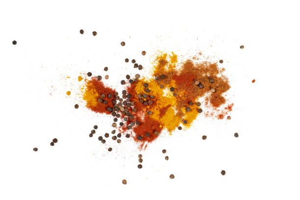 istock pile of different colorful spices isolated on white 2203569271