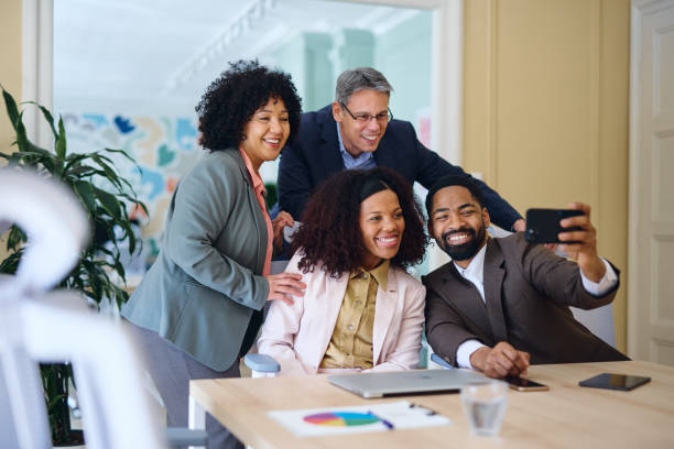 istock Business team taking a selfie in the office 2203570255