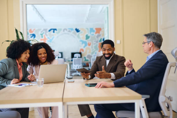 istock Business team discussing during a meeting in a modern office 2203570267