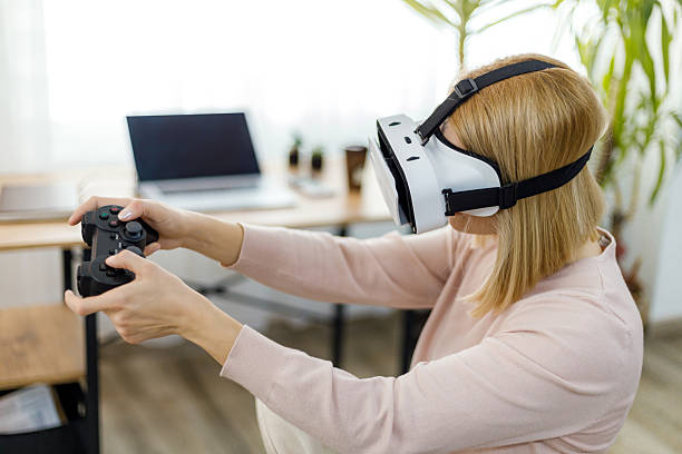 istock Enjoying virtual reality gaming at home 2203576027