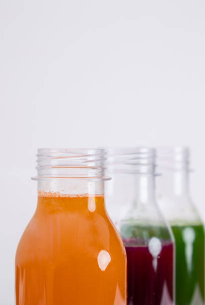 Close-Up Of Red Drink On Table