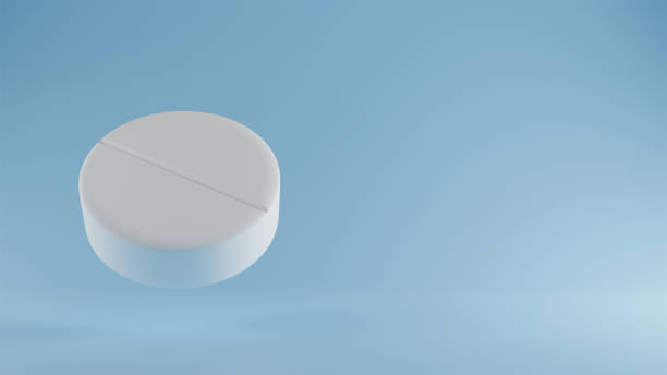 istock 3d model of a white round tablet on a blue background, medicine 2203579659