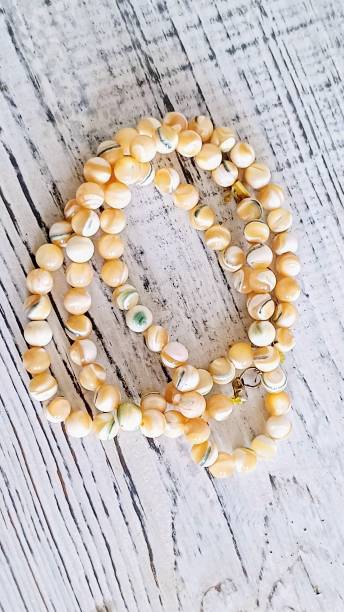 istock Cream colored beaded women's bracele 2203580973