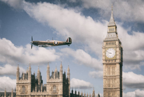 The iconic Mk I Supermarine Spitfire in flight, against the background of the Palace of Westminster in London Scale model photography.