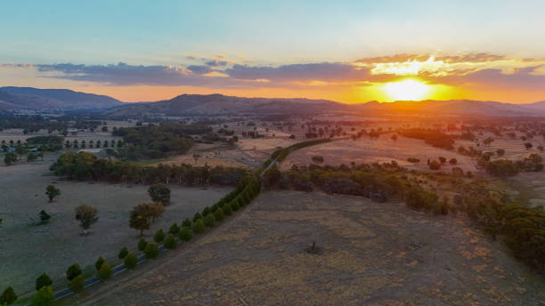 istock Sunset over farmland between Wodonga and Baranduda 2203584653