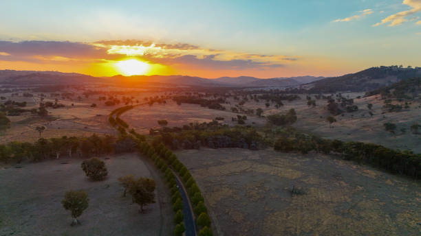 istock Sunset over farmland between Wodonga and Baranduda 2203584656