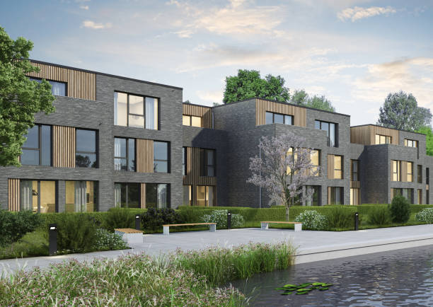 istock Modern town houses with grey bricks and wooden wall elements 2203586191