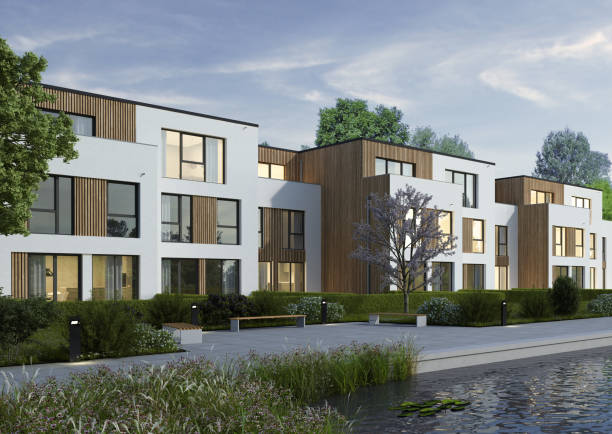 istock Modern town houses with white and wooden wall elements 2203586203