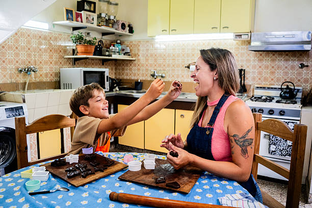 istock Mother and son cooking at home 2203586334