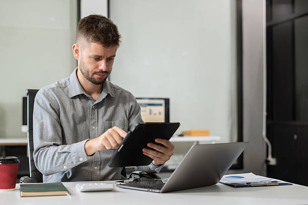 istock Happy man, entrepreneur, small business owner working online. 2203590136