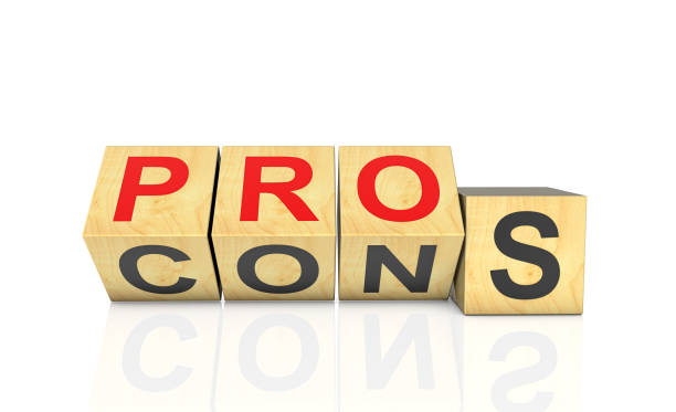 istock Flipping wooden cubes block for change PROS to CONS 2203592172
