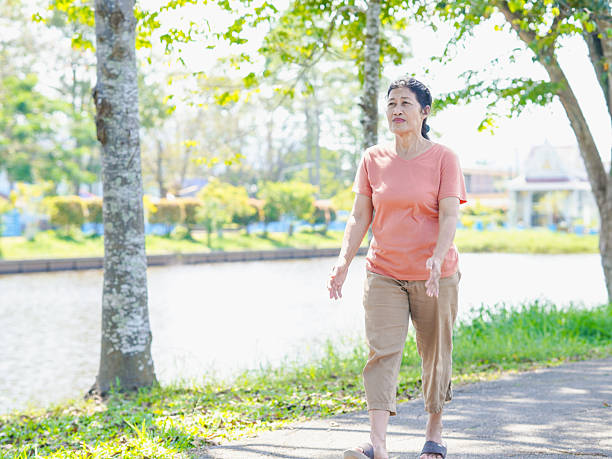 istock Elderly woman walking, running 2203595318