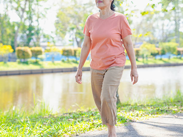 istock Elderly woman walking, running 2203595355