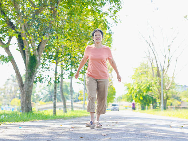 istock Elderly woman walking, running 2203595370