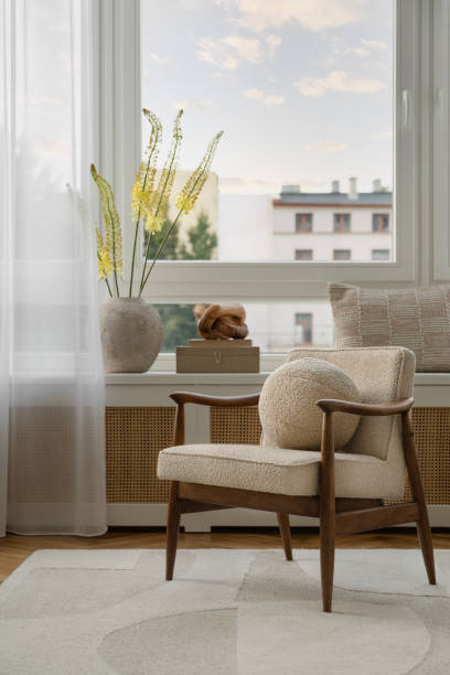 istock Boucle Armchair And Flowers 2203598232
