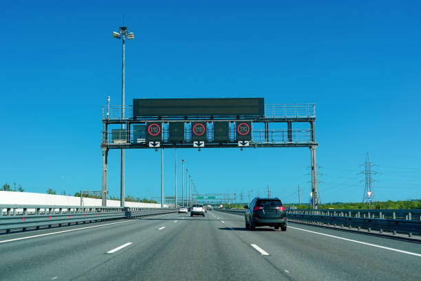 istock View of highway with electronic board and speed indicator for gate movement 2203599044