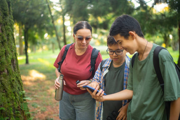 istock Family exploring nature in summer 2203599146