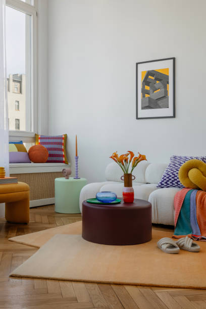 istock Vibrant interior featuring soft, comfy seating, bold prints, and fresh flowers for a welcoming atmosphere. 2203599198