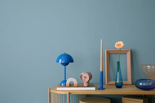 istock Contemporary interior styling with a blend of colorful and modern decor, including a unique vase and a balloon dog sculpture. 2203601995