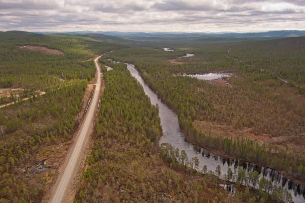 istock View of road and river. 2203602451