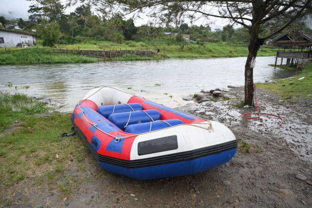 istock Inflatable boat for rafting on the river 2203602502