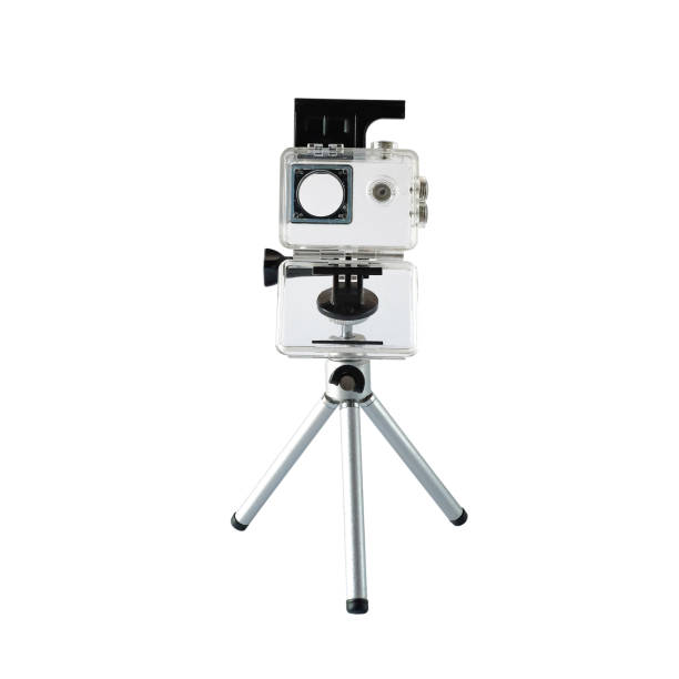 istock A housing case for Action camera over mini tripod on white background. 2203604387