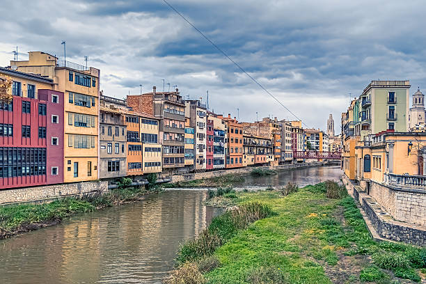 colourful houses along the Onyar River in the Spanish city of Girona; Girona, Spain