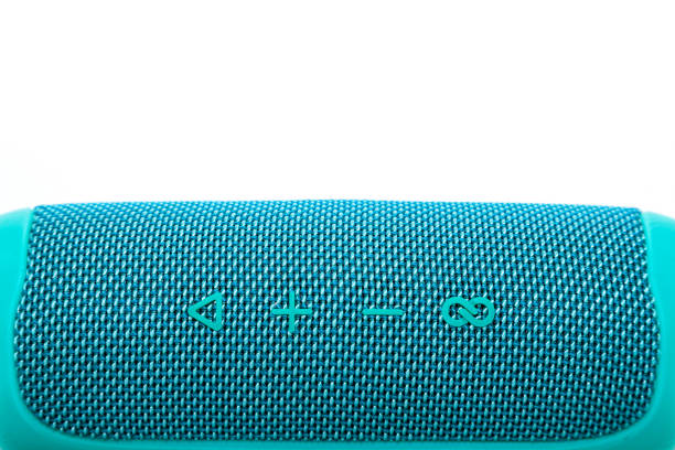 istock New wireless music speaker on a white background, turquoise. 2203608992