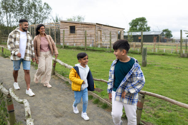 istock Parents And Kids Enjoying Zoo Day 2203611439