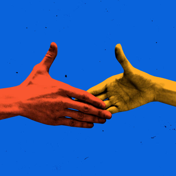 istock Two hands reaching for handshake in bold colors, symbolizing unity, collaboration, professional deal. Photocopy effect. 2203614059