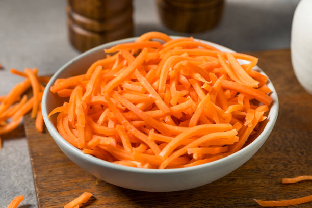 istock Orange Organic Shredded Carrot Shreds 2203614919