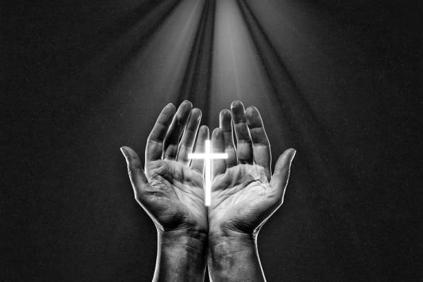 istock Christian Hands Praying in Black and White 2203622670