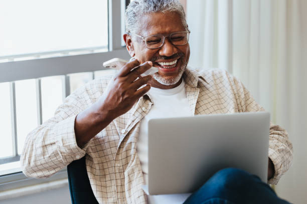 istock Tech-Savvy Senior: Mature businessman working remotely 2203627693